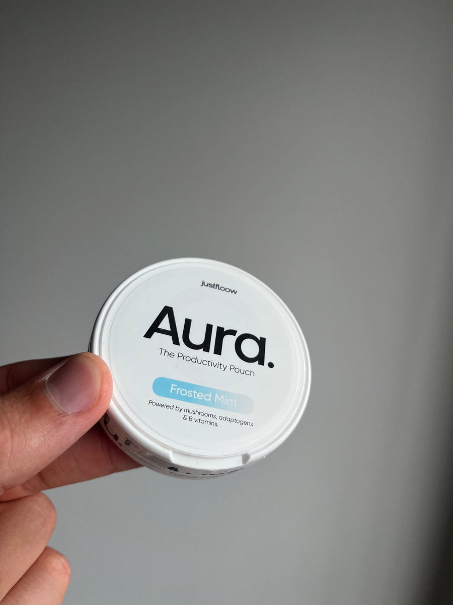 Customer holding Aura pouch