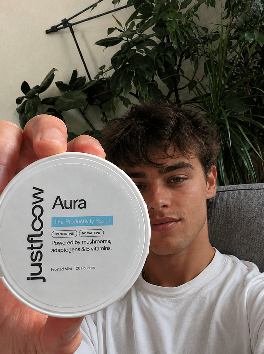 Customer holding Aura pouch