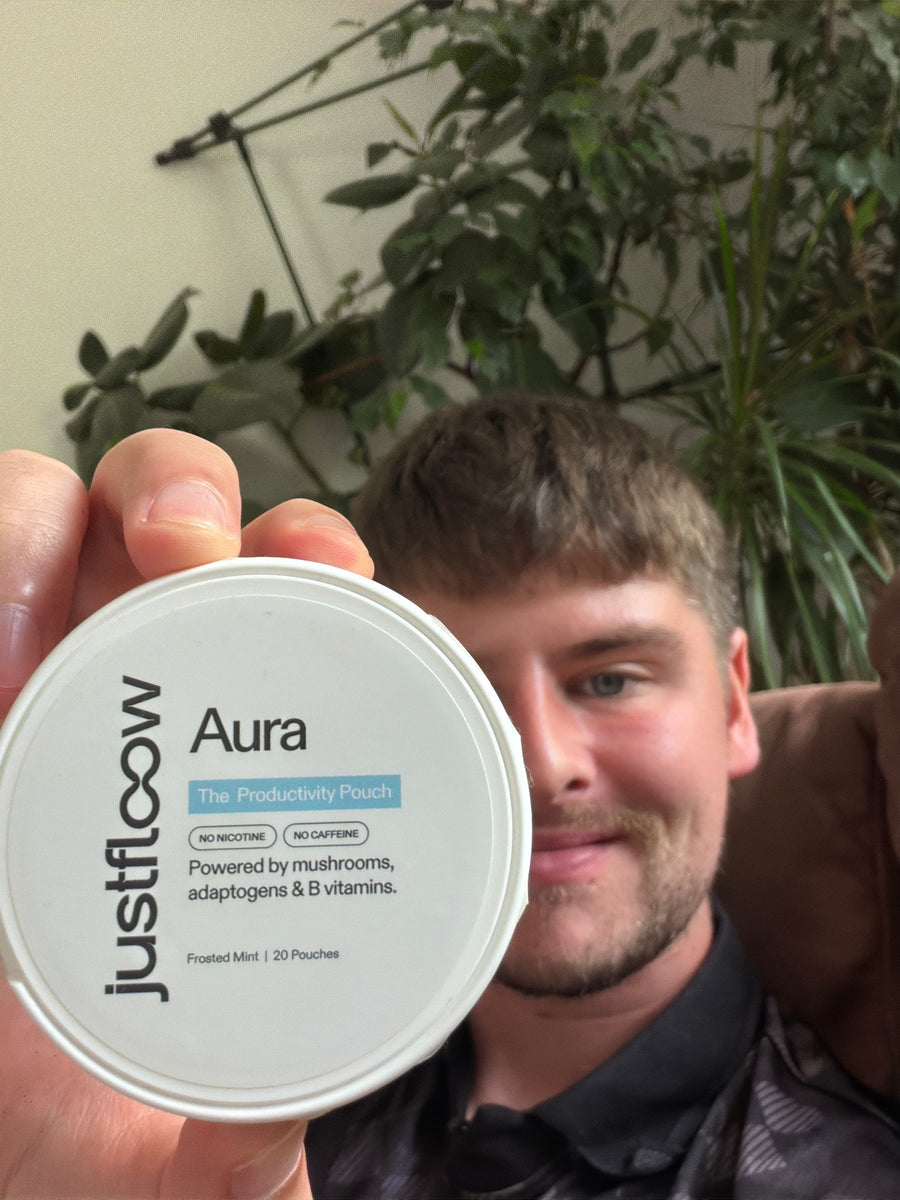 Customer holding Aura pouch